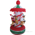 Happy holiday inflatable spinning carrousel for Christmas